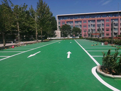 伟博施工育才学校通州分校地面沥青改色工程